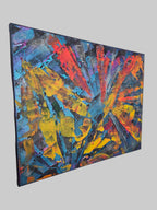 Vue latérale du tableau abstrait lumineux Explosion Chromatique™ mettant en valeur l'épaisseur de la toile et le travail de la matière.