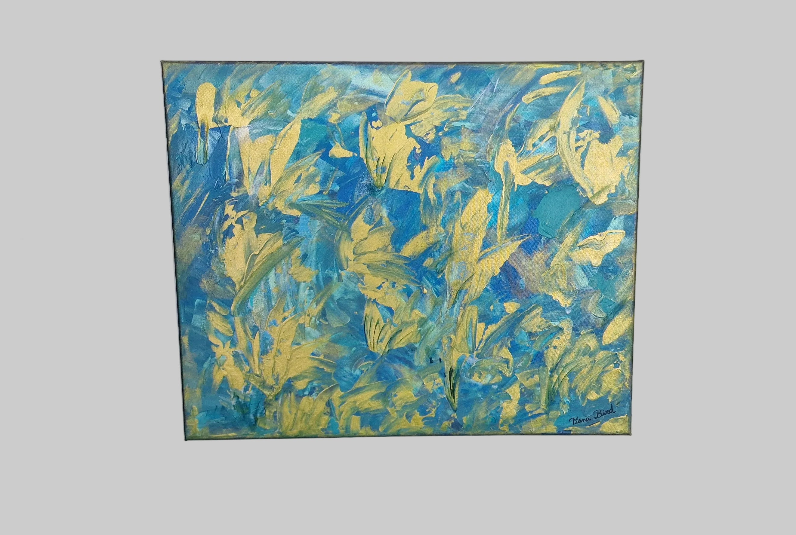 Vue laterale du tableau abstrait bleu et or montrant la toile montee sur chassis bois émotion fortes couleurs douces.