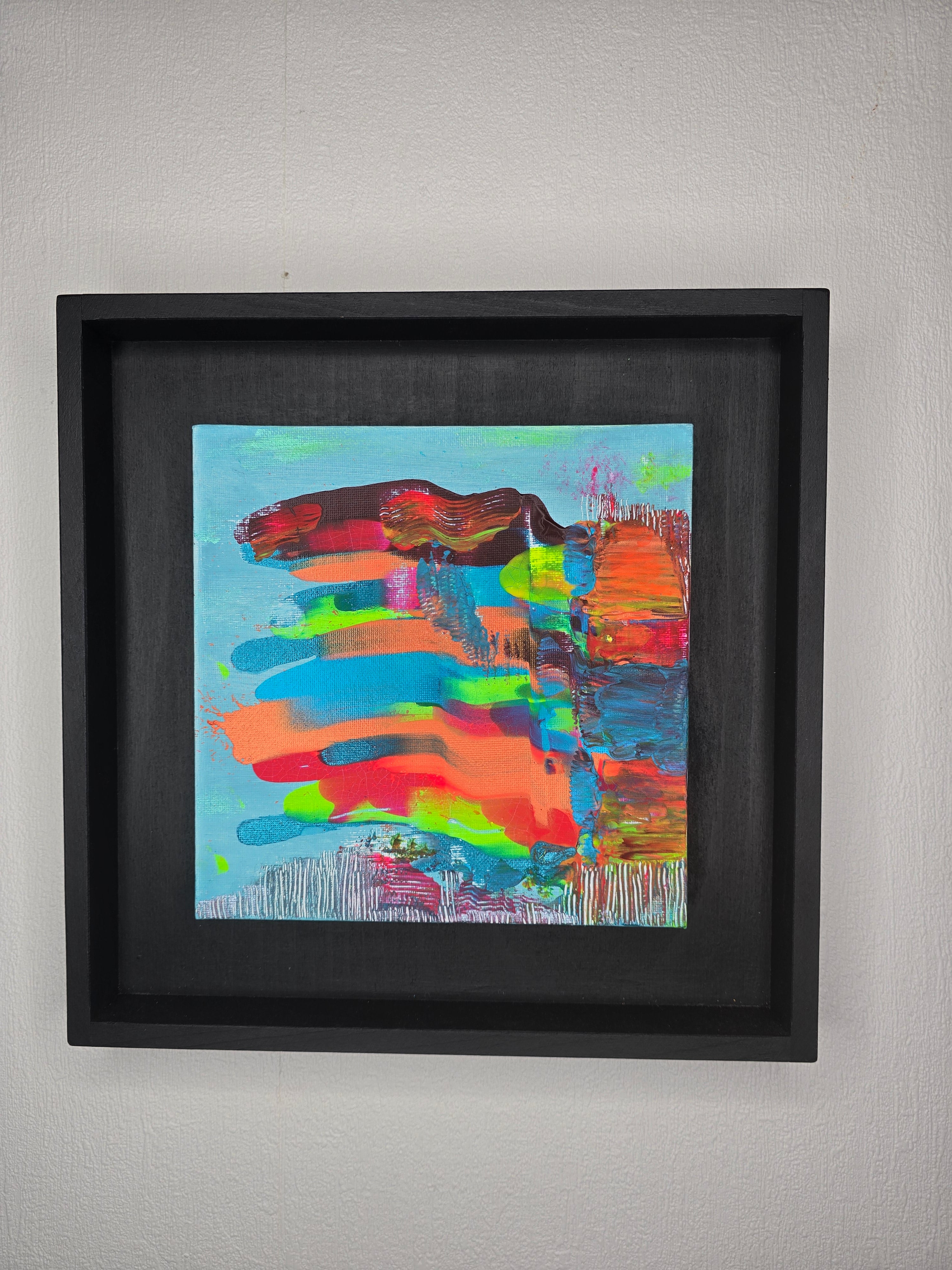 Œuvre abstraite contemporaine Écrin Néon™ avec peinture colorée expressive et encadrement noir style galerie d’art moderne